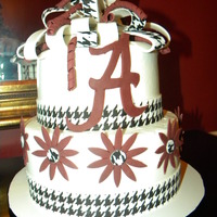 Rolltide Birthday Two tiered buttercream cake with fondant accents.