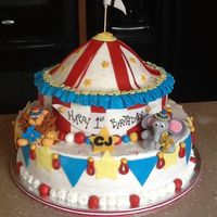 Carnival Cake Carnival 1st Birthday Cake8 over 12, cake was blue vanilla with blueberry buttercream filling.