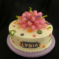 Lydia's 1St Birthday WASC with buttercream icing, fondant and gumpaste accents. Lydia's mom wanted a little "spray " coming out of the smash cake...