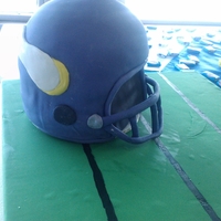 Football Cake I had a hard time with this one...being from Wisconsin and all. Apparently, someone at the wedding didn't realize it was a cake and...