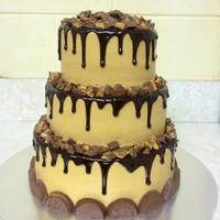 Reeses Anniversary Cake Chocolate Cake With Peanut Butter Icing Topped With Rich Chocolate Ganache And Reeses Peanut Butter Cups Reese's Anniversary Cake Chocolate cake with peanut butter icing, topped with rich chocolate ganache and Reese's peanut butter...