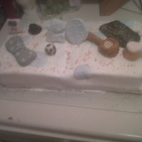 Favourite Things! This was a cake for my boyfriends flatmate and decided to just put on random things that he likes. My boyfriend helped with the bow tie,...