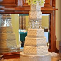 Crystal Wedding Cake A vanilla cake with vanilla buttercream covered in MMF. I also made the cake stand myself. :)