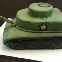 Army Tank WASC cake with fondant accents. Colors airbrushed on. Thanks for looking