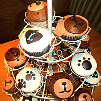 Puppy Cupcakes I made these cute cupcakes for a puppy themed baby shower. All covered in rolled MMF with mmf toppers.