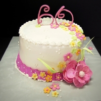 Girlie Girl Cake Butter Cream Icing with Gumpaste flowers. Gumpaste Numbers