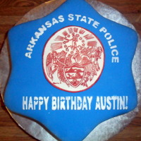 Arkansas State Police Cake This cake is for a little boy turning 6 whose dad is with the Arkansas State Police. His mom told me he has wanted an ASP cake for the last...