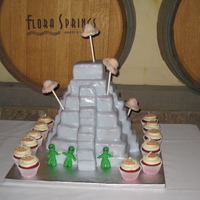 Mayan Pyramid & Aliens Cake for a combined birthday. They wanted a Mayan pyramid with UFO's flying around it and aliens, one for each of the birthday people....