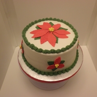 Christmas Cake 2011 Red Velvet cake for Christmas. Our family's favorite. Buttercream icing, fondant & gumpaste poinsettias. 12/2011