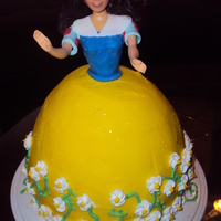 Snow White Snow White birthday cake for a little girl. Dress is buttercream with royal icing flowers. The doll herself is dressed in fondant. So fun...
