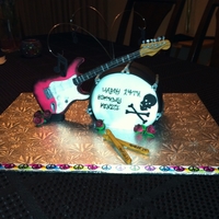 Rock N Roll Birthday I was really inspired by Ray77 Rock n Roll cake and made slight modifications for it to suit my client. The guitar, roses, drumsticks were...