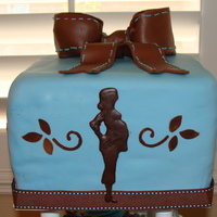 Baby Shower Cake Baby shower cake. The cake is yellow cake with buttercream, fondant, ganache stencil, and chocolate pregnant lady. It was my first time...