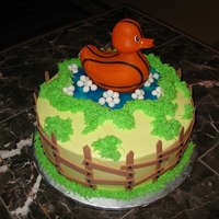 Basketball Duck Last minute baby shower cake, I was told sports theme (the dad loves basketball) and for a boy. This is all I could come up with