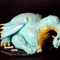 Dragon Cake Over 2000 circle were cut and placed on this cake for scales! Phew!