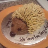 Hedgehog Cakelet hedgehog cakelet. adorned with slivered almonds.