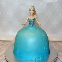 Frozen Elsa Princess Cake A princess cake created with a light up musical Elsa doll from Frozen.