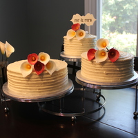 Calla Lily Wedding Cake My first wedding cake! Tiers are 6" and 8" deep dark chocolate and 10" French vanilla, all with textured vanilla buttercream...