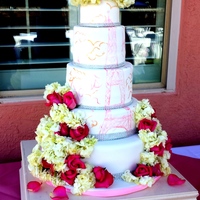 Beautiful And Delicate Parisian Themed Wedding Cake With Hand Painted Eiffel Tower Fresh Roses And Hydrangeas And A Bling Banding Border Beautiful and delicate Parisian themed wedding cake with hand painted Eiffel tower, fresh roses and hydrangeas, and a bling banding border...