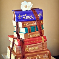 Romantic Stacked Books Wedding Cake This cake was soooo much fun! The bride is an English teacher, and the groom an author, so their whole theme was books and reading! The...