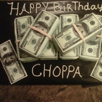 Money Stcak Cake I used a 9x13 cake pan two of them and used a 100 dollar bill image as a template and cut into loaves each pan made 3 i used a 2 dabs of...