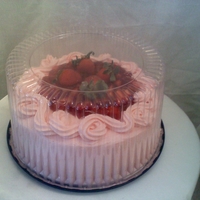Strawberry Cake-Cheese Cake 10" Double layer Strawbery flavored yellow cake with a 2'' middle strawbery cheese cake with filling.. Yummy