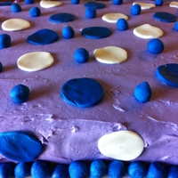 Purple Birthday Cake Double chocolate cake, cream cheese frosting, fondant dots and balls. This was designed by the birthday girl and she loved it. :)
