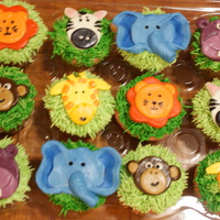Jungle Cupcakes handmade fondant faces. Grass buttercream