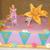 Tangled With Healing Flower This was for my daughter's 7th birthday. She wanted a square cake with Rapunzel. I wanted to make a gumpaste flower. So this is what...