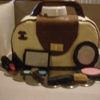 My First Purse Cake My Granddaughters 16th BD cake. The white thing under the handle was supposed to be removed before I took the pic. I bought a new camera...