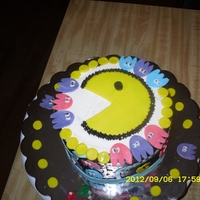 Pacman Cake Made for my sister. She loves pacman. buttercream with fondant cutouts