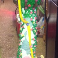 Tangled Cake 2 10" cakes with 2 8" cakes covered in MMF fondant. Tower & house made of rice krispie treats covered in fondant.