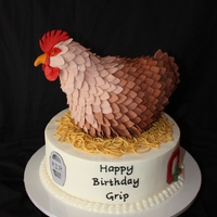 50Th Birthday Chicken Cake This is a cake that I did for a good friend of ours who turned 50. The chicken is a round cake with RKT neck and head and tail. The...