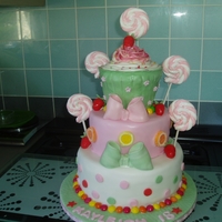 Another Candy Cake these sweetie cakes seem to be so popular, i have made several i the past few months. lollipops are marshmallow and strawberries and bows...