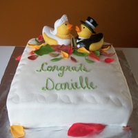 Bridal Shower Duckies 10 inch WASC cake with chocolate buttercream filling, buttercream and MMF on the outside. Leaves made out of fondant/gumpaste mix. Love...