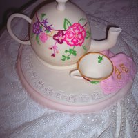 Floral Tea Pot With Tea Cup White almond cake with vanilla Italian meringue buttercream and vanilla almond mmf. Gum paste tea cup