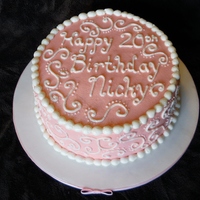 Pink With White Scrollwork Birthday Cake 8-inch chocolate cake with buttercream frosting
