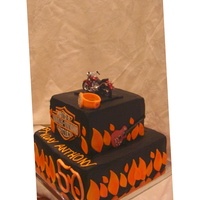 Harley Party Our client hired us to make her husband a over the top Harley cake for his 50th Birthday. He loves harleys but he also loves guitars and...
