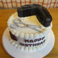 Beautician Cake Hair dryer made of cake and covered with modeling chocolate.