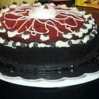 Red Velvet Cheesecake Red Velvet cheese cake. with a layer of chocolate ganache, cheesecake and red velvet cake.
