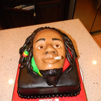 Bob Marley/rasta Man Cake I was trying to make BoB Marley but since this was my first time scuplting a face I was glad that it at least came out looking like a...