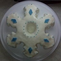 Snowflake Snowflake shaped cake. Could not find an example anywhere - so I created a template and carved away! Iced in buttercream, covered in MMF,...