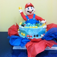 Super Mario For A Super Birthday Boy! My Grandson wanted a Super Mario cake for his birthday, and since I had just started experimenting with Fondant, I went looking. This cake...