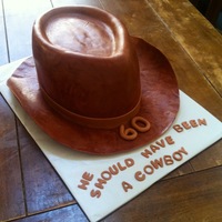 Cowboy Hat Cowboy hat for a great friend. Brim is cut fondant that has been formed and dried.