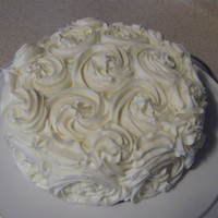 Mothers Day Rose Cake Red velvet cake with cream cheese icing. Couldn't get my icing as stiff as I wanted due to using the cream cheese, but it tasted great...