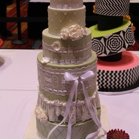 Sugar Lace This cake was the second place on Connecticut Cake Competition (intermediate division)It has Sugarveil, ribbon insertion, edible gems,...