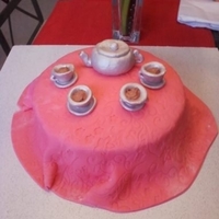 Tea Party For a 5th birthday princess tea party. Fondant covered cake, gumpaste tea set.