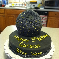 Death Star From Star Wars This is a chocolate cake with pastry cream filling. 10 in round cake covered in fondant. Death Star is the 6 in Wilton sports ball pan...