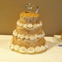 50Th Anniversaryfondant Ribbon Roses Wasc Cake With Buttercream Filling Not The Best Picture But Fondant Covered With Gold Sugar Cry 50th Anniversary....Fondant ribbon roses. WASC cake with buttercream filling. Not the best picture but fondant covered with gold sugar...