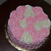 Rose Cake used two of the techniques that I like. petal effect and rosettes.
