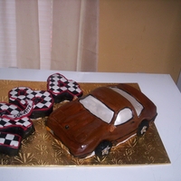 1984 Corvette CLASSIC 1984 CORVETTE CAKE. HAND CARVED, I DECIDED TO CARVE THE CAR'S YEAR FROM CAKE AND DECORATE IT LIKE A CHECKERED FLAG